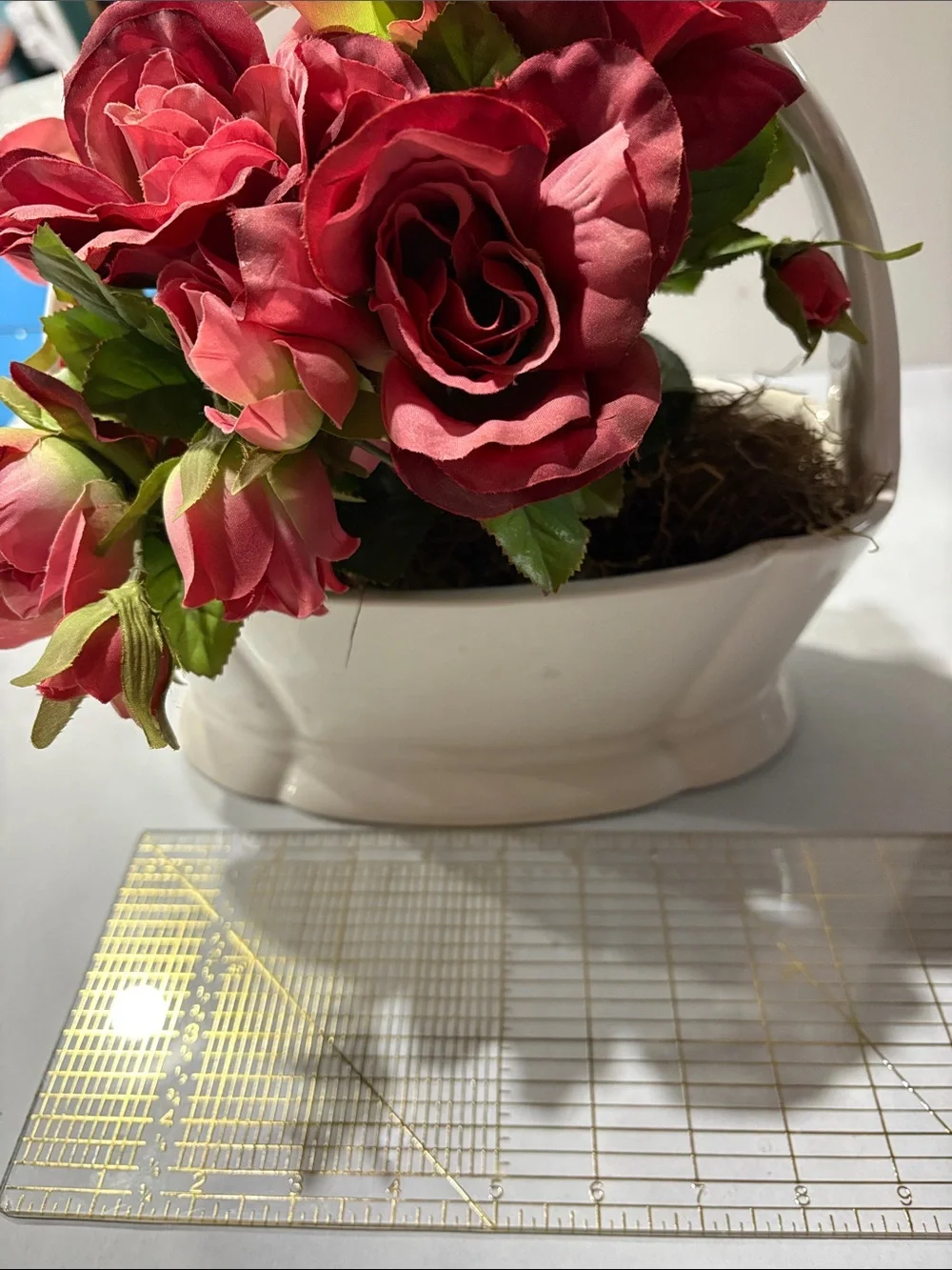 Rose Artificial Arrangement in White Ceramic Basket half moon bay California